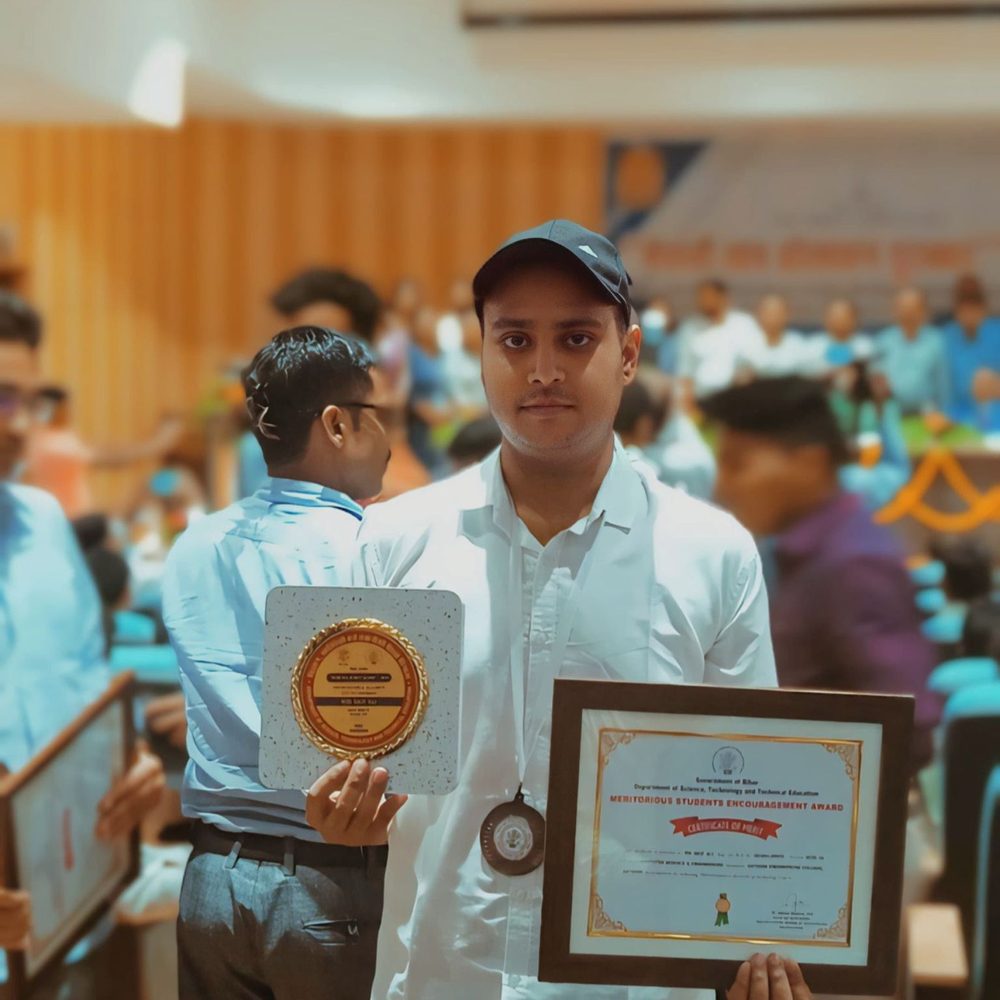 Md Saif Ali holding the Meritorious Students Encouragement Award and medal